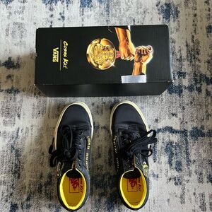 Vans Black and Yellow Low Top Sneakers